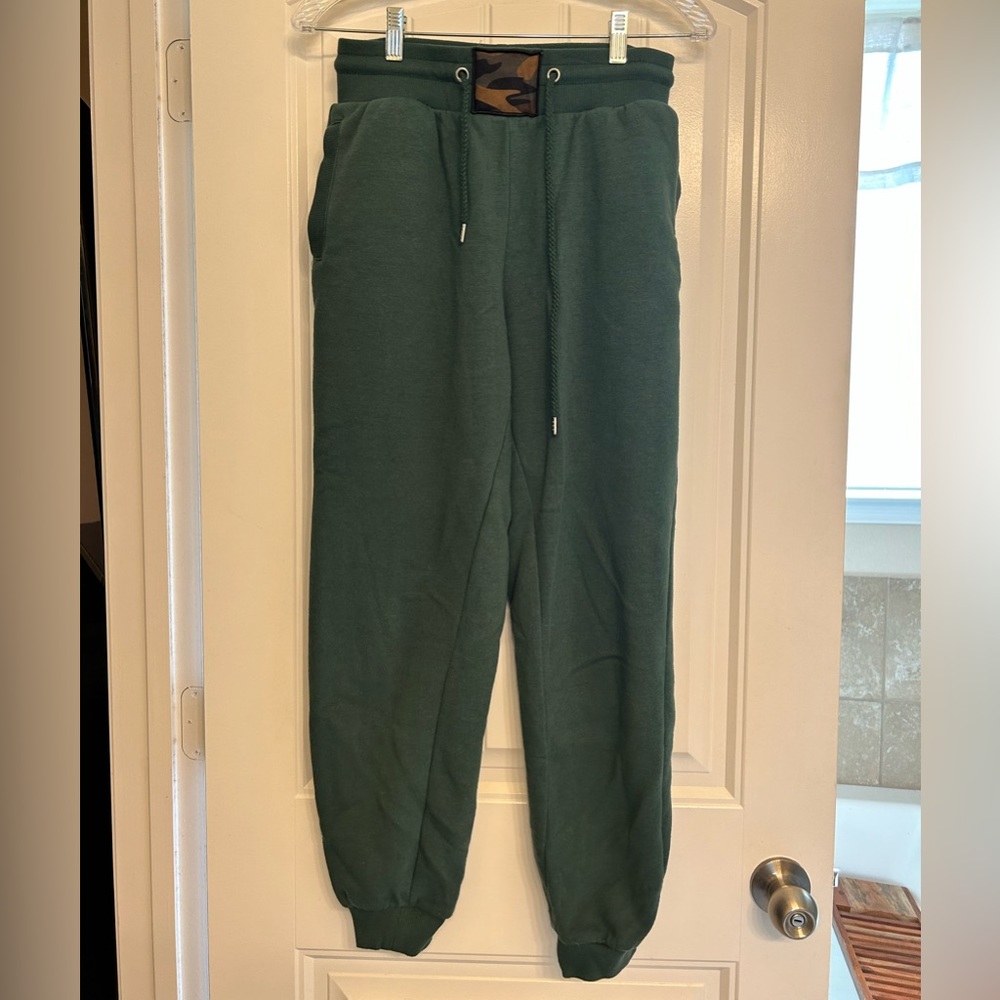 Green sweatpants